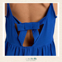 Back view of the model wearing the Molly Bracken dress, demonstrating the breezy A-line silhouette and the beautiful movement of the tiered skirt