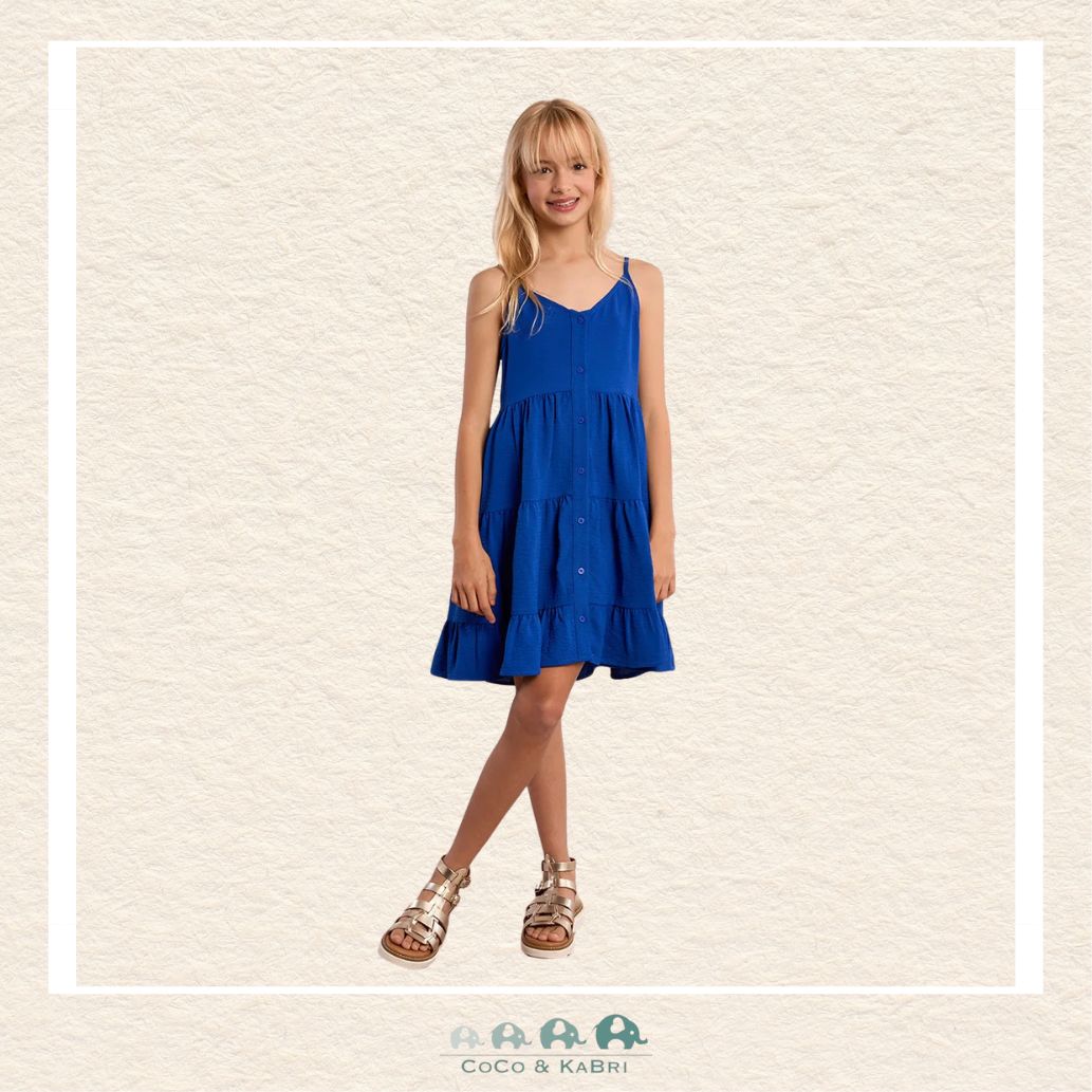Front view of a girl wearing the Molly Bracken Cobalt Blue Ruffled Dress, showcasing the striking vibrant hue and the elegant full-length button-down detailing