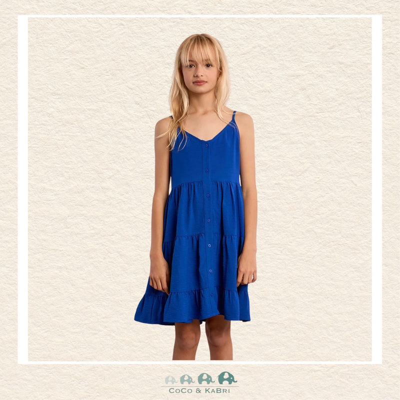 Front view of a girl wearing the Molly Bracken Cobalt Blue Ruffled Dress, showcasing the striking vibrant hue and the elegant full-length button-down detailing