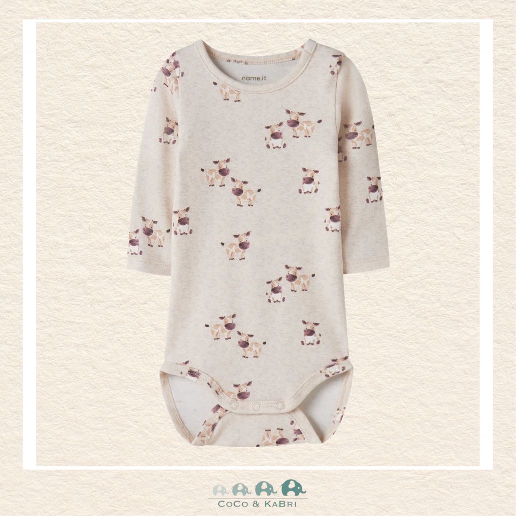 Front view of the Name It Baby Boy Diaper Shirt featuring a playful cow graphic and a comfortable envelope-style neckline