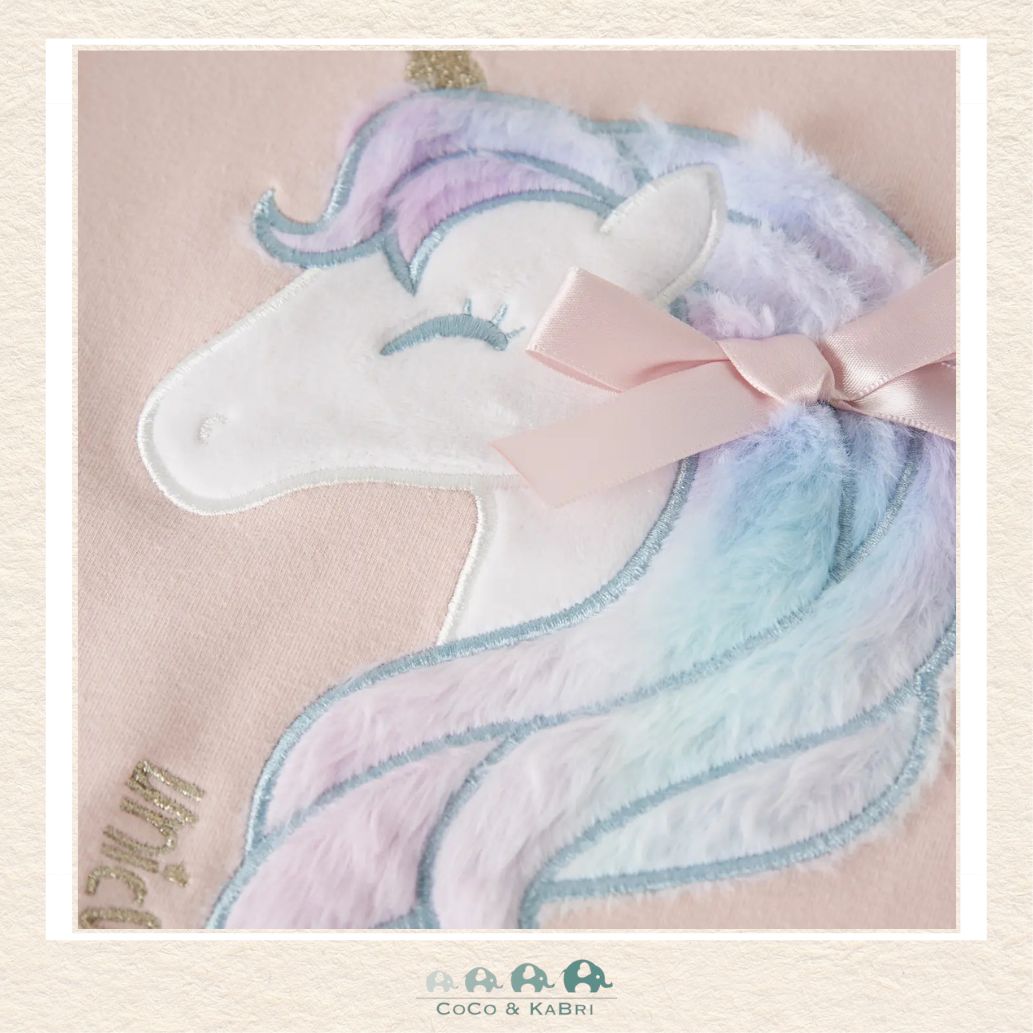 Detailed close-up of the unicorn illustration and pink fabric highlighting the vibrant graphic details and the premium, fleece-soft boutique texture