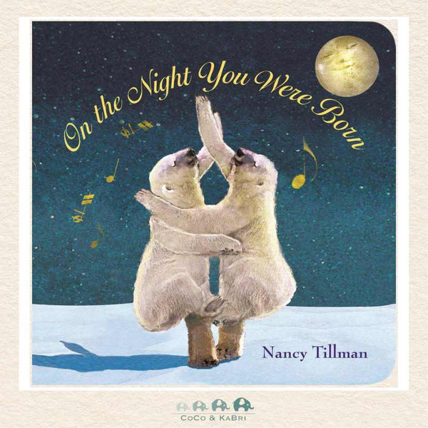 On the Night You Were Born board book featuring a magical night sky with a smiling moon and polar bears dancing
