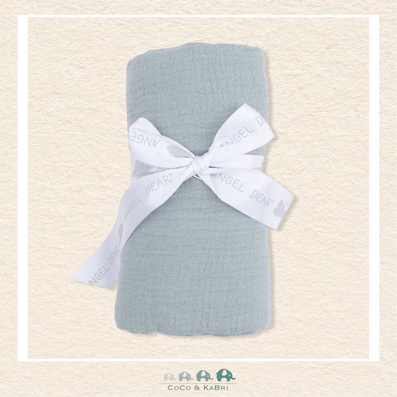 Solid Muslin swaddle blanket in Jadeite green rolled and tied with a boutique ribbon for a timeless, high-end gift presentation | Canada