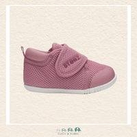 Pink baby shoe with a strap on a beige background, Brooks Alberta Canada