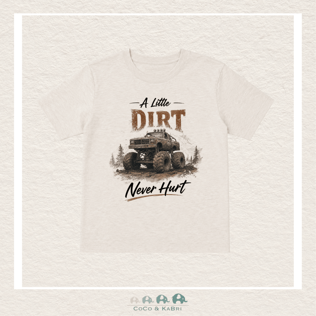 White t-shirt with off-road vehicle graphic and text 'A Little Dirt Never Hurt' on a textured beige background.
