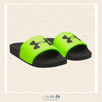 Pair of green and black slides with Under Armour logo on a beige background