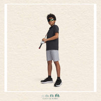 Front view of a youth boy wearing the black striped Under Armour Tech polo, showing the structured collar and professional athletic fit for school or sports | Canada